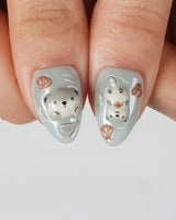 Otter Momo cozy animal nail art with sculpted otters and seashell accents
