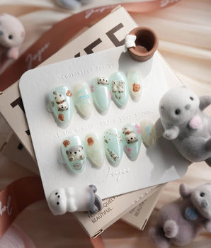 Otter Momo handmade press-on nails featuring otter nail art