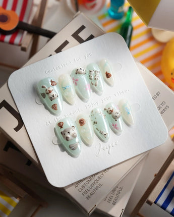 Otter Momo short almond nails with cuddly otter sculpture and soft water ripples