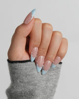 Oyster Blue medium almond nails with pearl smile line and miniature silver starfish pendant