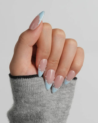 Oyster Blue medium almond nails with pearl smile line and miniature silver starfish pendant