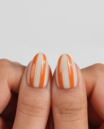 Parasol custom-size extra short almond nails with hand-painted parasol stripes