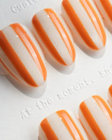 Parasol hand-painted striped nails inspired by vintage beach umbrellas