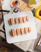 Parasol extra short oval press-on nails with glossy vintage striped canvas look