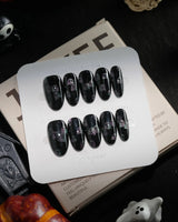 Party Spirits handmade press-on nails in medium oval shape by Joyee Nails