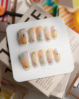 Pastel Relic in short coffin shape with milky champagne shimmer and delicate gold lines