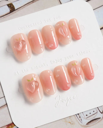 Peach Dew soft fruit nails with peach gradient, translucent shapes, and dew texture