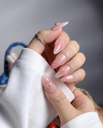Peach Dew hand-painted nails with 3D peach shapes and watery gel shine