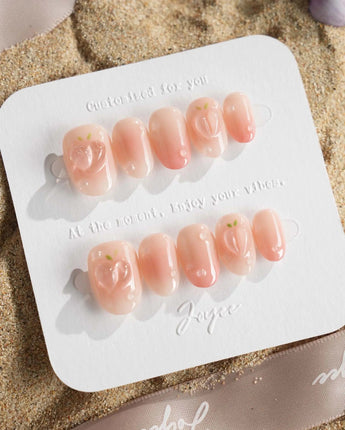 Peach Dew close-up of peach gradient nail art with raised fruit and water droplets
