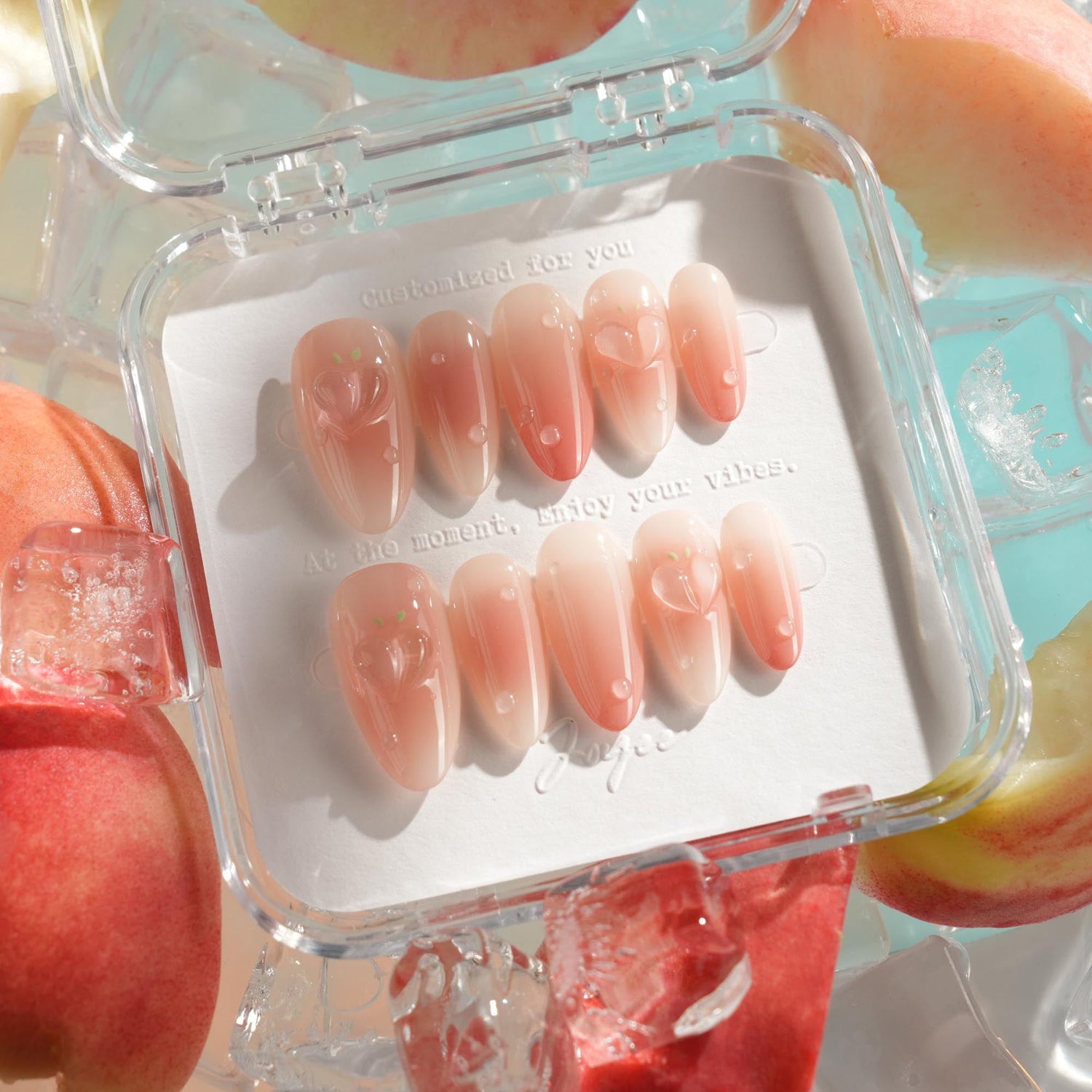 Glossy peach press-on nails with jelly heart