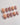 Pearl accented french nails with pastel sakura design	