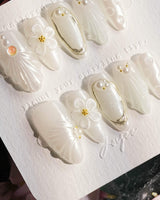 Pearl Bloom press-on nails — Pure White Pearlescent, 3D Flowers & Shell Texture. handmade nail art by Joyee Nails