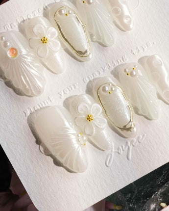 Pearl Bloom press-on nails — Pure White Pearlescent, 3D Flowers & Shell Texture. handmade nail art by Joyee Nails