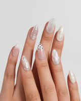 Pearl Dot short almond press-on nails with iridescent shell accents and hand-placed dots