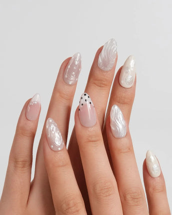 Pearl Dot short almond press-on nails with iridescent shell accents and hand-placed dots