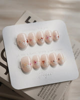 Petal Press press-on nails — Warm Creamy Skin Tone, Hand-painted Florals & glitter Shimmer. handmade nail art by Joyee Nails