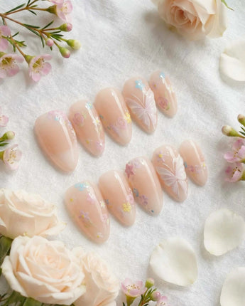 Petal Rain press-on nails in extra short almond shape — nude, 3D White Butterfly Wings & Pastel Wildflowers.