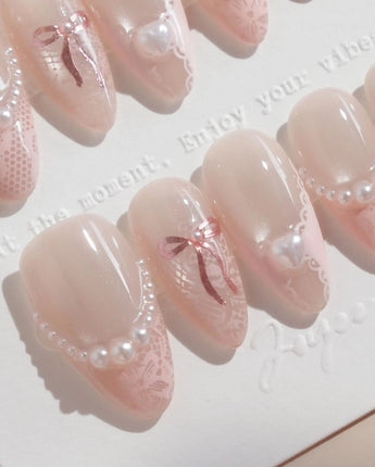 Pillow Talk nails in medium almond — Pearl Satin Pink, Lace