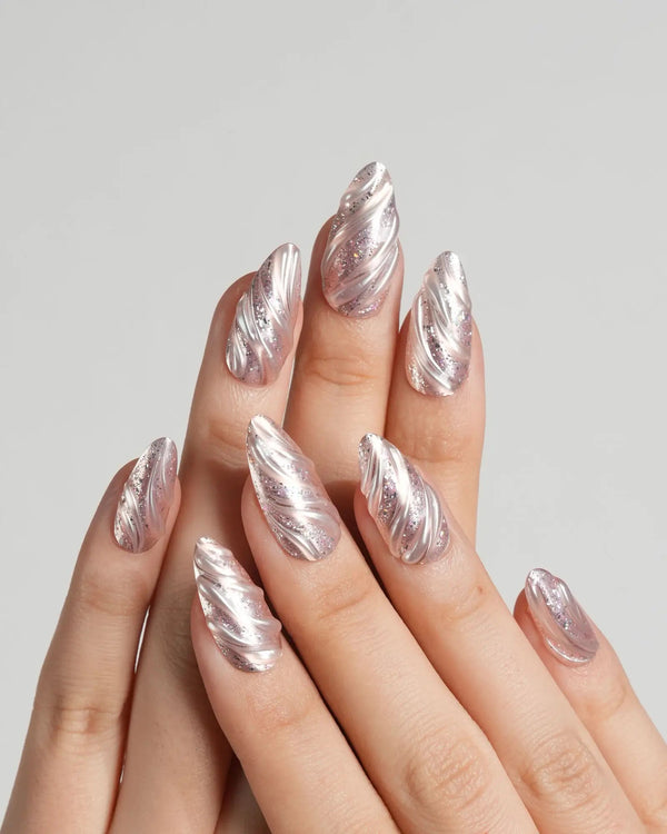 Pink swirl Christmas press-on nails with 3D glitter design