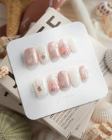Pink Treasure extra short coffin press-on nails with dusty rose marble texture