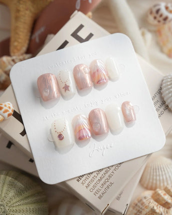 Pink Treasure extra short coffin press-on nails with dusty rose marble texture