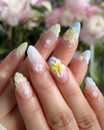 Plumeria-Island Breeze nail art close-up showing Dreamy Macarons, 3D Plumeria & Shell Textures. details