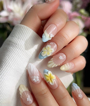 Plumeria-Island Breeze handmade press-on nails featuring Dreamy Macarons, 3D Plumeria & Shell Textures.