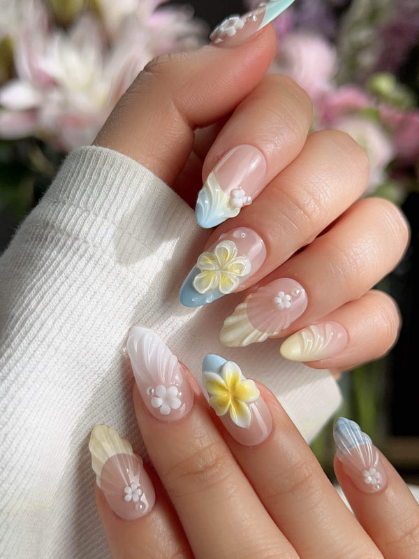 Plumeria-Island Breeze handmade press-on nails featuring Dreamy Macarons, 3D Plumeria & Shell Textures.