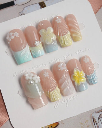Plumeria-Island Breeze press-on nails in medium square shape — Dreamy Macarons, 3D Plumeria & Shell Textures.