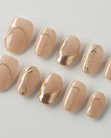 Poetic Glamour Nude press-on nails in extra short oval shape — nude french tip gold line