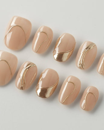 Poetic Glamour Nude press-on nails in extra short oval shape — nude french tip gold line