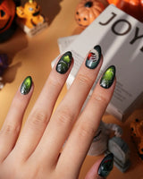 Poison Apple press on nails with a green skull poison apple, fanged grin, bat and 3D silver crown on green and purple cat eye - image 6