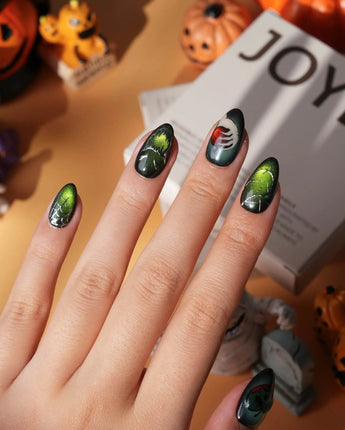 Poison Apple press on nails with a green skull poison apple, fanged grin, bat and 3D silver crown on green and purple cat eye - image 6
