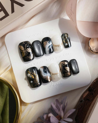 Poison Bloom press-on nails in short square shape — Black & Gold, Sculpted Marble.