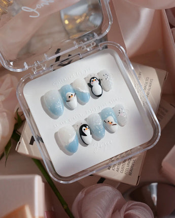 Polar Friends nails in extra short almond — Icy Blue & Pure