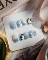 Polar Friends nails in extra short squoval — Icy Blue & Pure