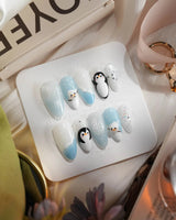 Polar Friends nails in medium almond — Icy Blue & Pure