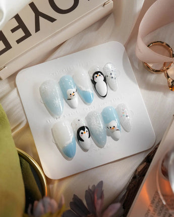 Polar Friends nails in medium almond — Icy Blue & Pure