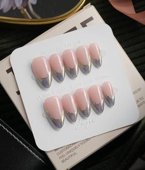 Polaris chrome French press on nails, nude base with an icy blue silver tip and a gold hand-drawn line - image 2