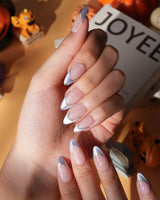 Polaris chrome French press on nails, nude base with an icy blue silver tip and a gold hand-drawn line - image 3