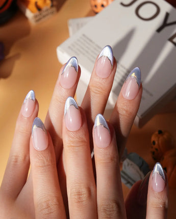 Polaris chrome French press on nails, nude base with an icy blue silver tip and a gold hand-drawn line - image 4