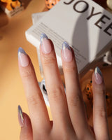 Polaris chrome French press on nails, nude base with an icy blue silver tip and a gold hand-drawn line - image 5
