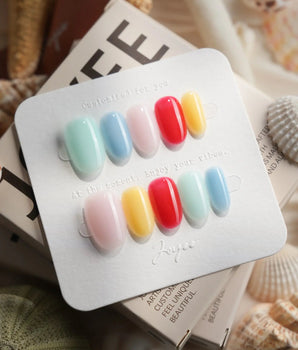 Popsicle short oval press-on nails with a bold frozen treat color palette