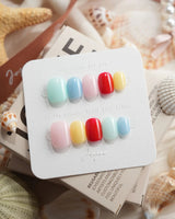 Popsicle color block press-on nails in extra short squoval shape