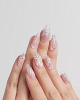 Wonderland press-on nails — Ethereal Pearl Pink Cat-eye, 3D Bows & Water Ripple Textures. handmade nail art by Joyee Nails