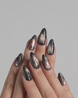 Thorned Spell press-on nails — black cat eye gold outline rose thorn design handmade nail art by Joyee Nails