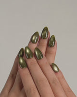Glint Olive nail art close-up showing olive green cat eye shimmer details