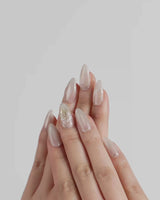 Morning Air nail art close-up showing Fresh Creamy Nude, Hand-painted Metallic Daisies & Simple gold Wire. details