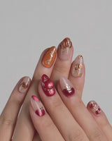 Autumn Bounty press-on nails video with 3D pumpkin, apple and gold outline details