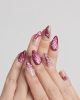 Velvet Flow press-on nails video with berry red cat-eye shimmer and metallic butterfly wings
